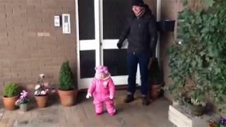 Cute baby sees snow for the first time.  Great reaction