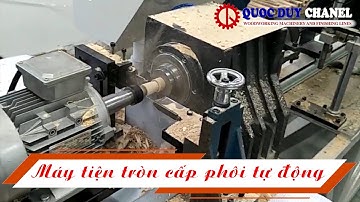 Máy tiện tròn cấp phôi tự động - Máy tiện hạt tròn Quốc Duy