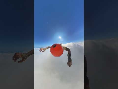 Skydiver Records Himself Free Falling Through Clouds
