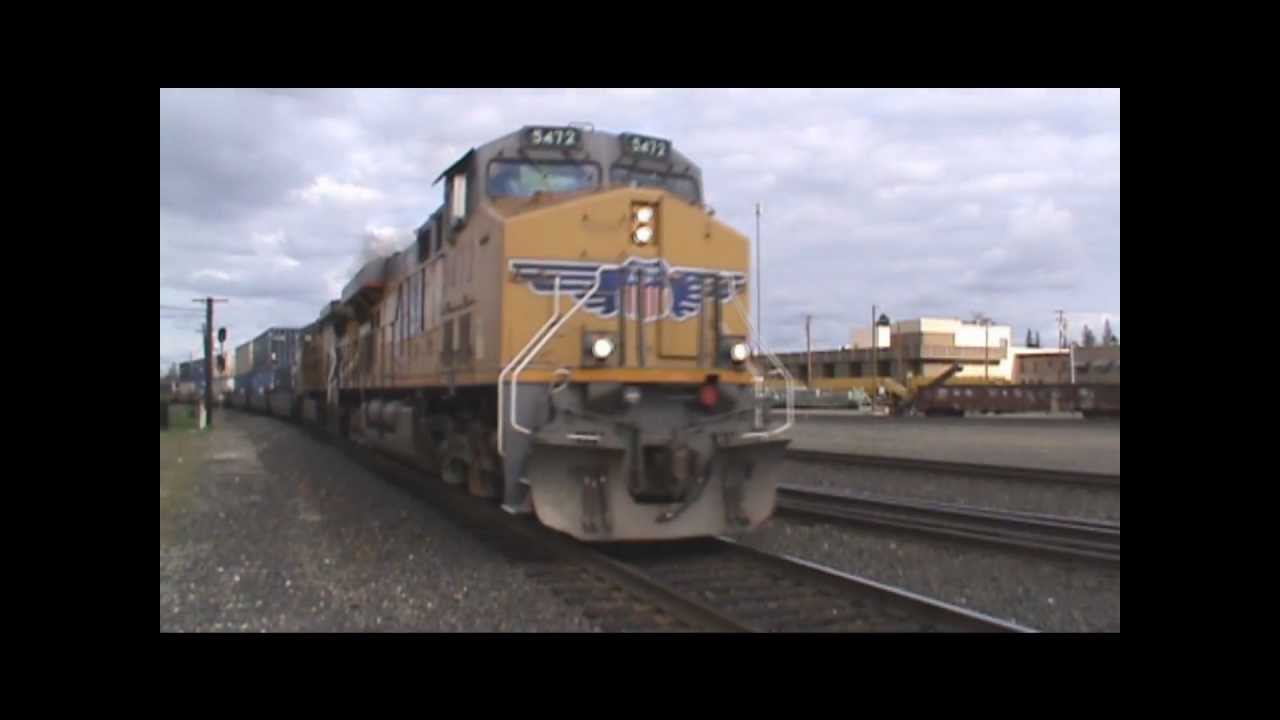 bnsf 5729 UP 5472 Leads a Stack Train through Roseville (2/11/12)