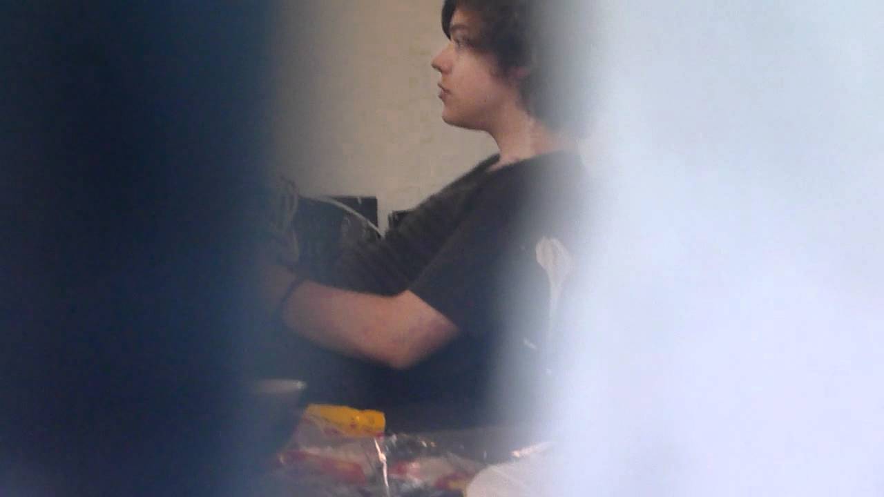 Harry Styles eating Swedish candy like a real beast