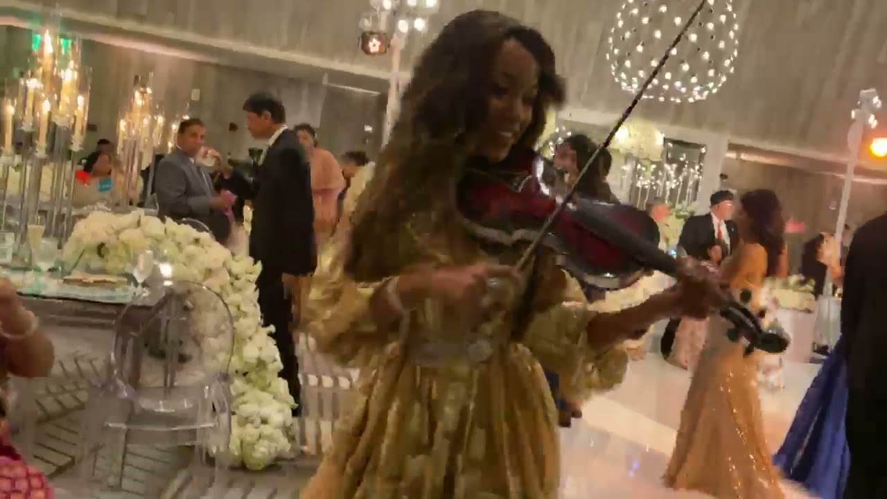 Melissa performing as a female strolling violinist