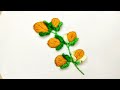 Tiny flowers made with hand embroidery.