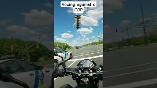 motorcycle "race"against a cop