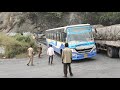 Dhimbam ghat road TNSTC bus hit tothe back side bcz taking reverse