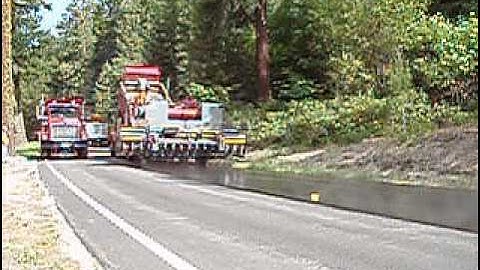 GEFFS CHIP SPREADER WITH EXPANDABLE HOPPER DOING FOREST ROADS