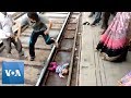 Indian Baby Survives Being Run Over by Train