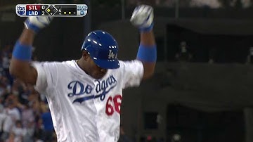 Puig hustles into third standing for a RBI triple