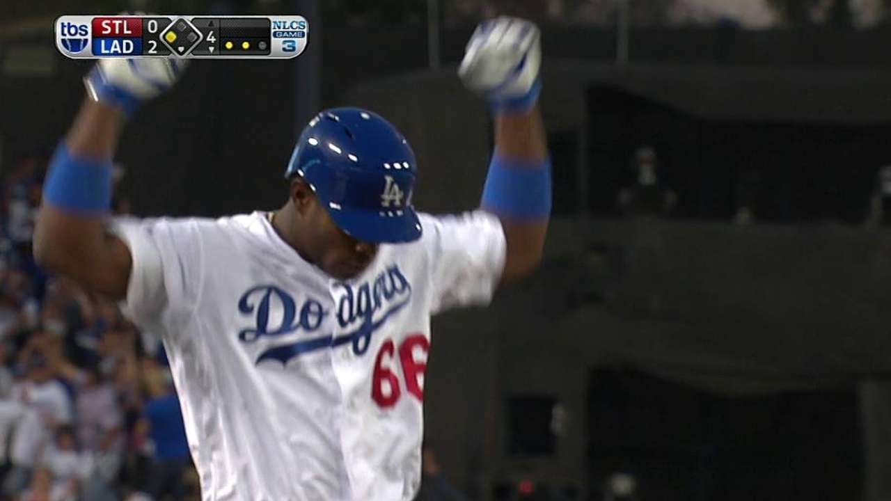 Puig hustles into third standing for a RBI triple 