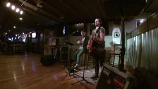 Dave McGarry and Pat Gerasia of RED SUN RISING  performing at an open mic night.