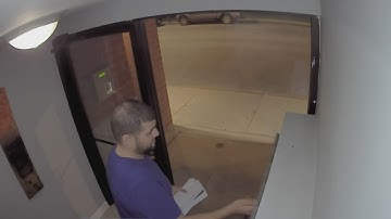 Mail thief caught on camera using postal master key in Chicago condo building