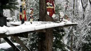 Cute G scale Christmas train set-up on tree mounted platform, action in the snow.