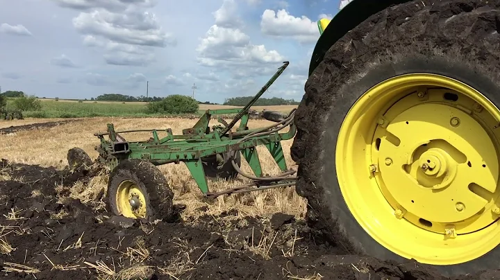 John Deere 830 Diesel Plowing