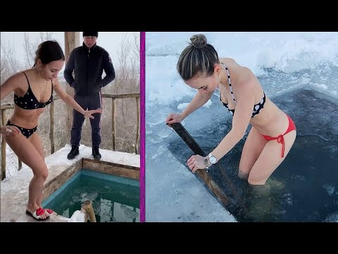 Крещенские окунания в прорубь красивых русских девушек