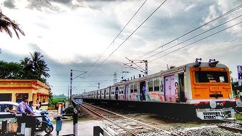 High Speed New Ad-Printed Colourful EMU local Train Heatedly Riding Out At Railgate