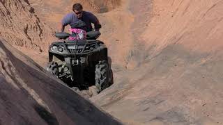 It Takes 2 Guys to get a Can-am Outlander 1000 Atv up Hells Gate on Hells Revenge Moab Utah