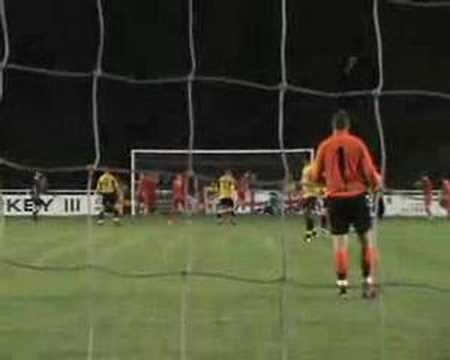 The Banbury keeper makes a save against Bashley in the Southern League Premier Division clash.