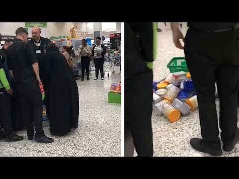 Woman accused of shoplifting using her abaya