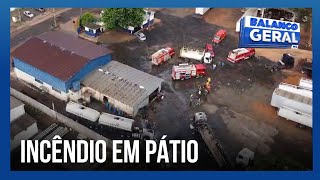 UMA PESSOA FERIDA: Incêndio em pátio de transportadora destruiu três veículos