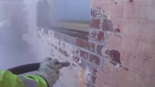 Soda blasting brick wall