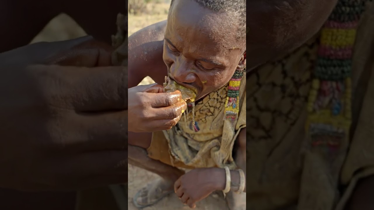 Hadzabe Cooking and Sharing a Warm Group Meal 