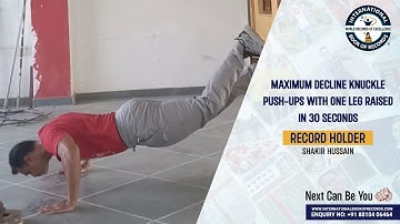 MAXIMUM DECLINE KNUCKLE PUSH UPS WITH ONE LEG RAISED IN 30 SECONDS