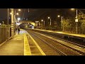 class 37 219 and 37 610 pass with a track inspection train