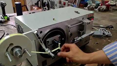 Automatic E core taping machine WM-1948E. newwinhk@hotmail.com
