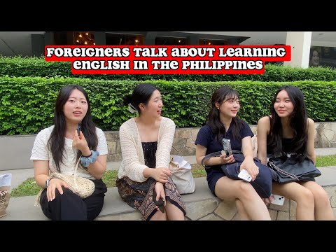 Why do foreigners study English in the Philippines?