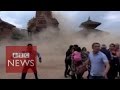Nepal earthquake shows terrified tourists as the temple collapses  bbc news