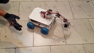 Arduino based Hand Gesture Controlled Robot with Robotic arm