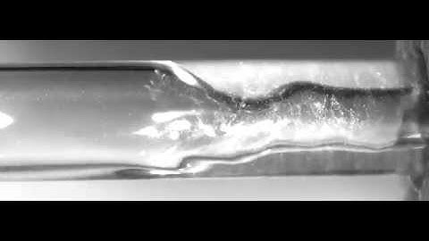 Fluid Dynamics Within the Vortex Fluidic Device