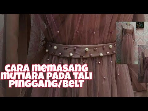 Video: Betapa modisnya mengikat ikat pinggang pada gaun