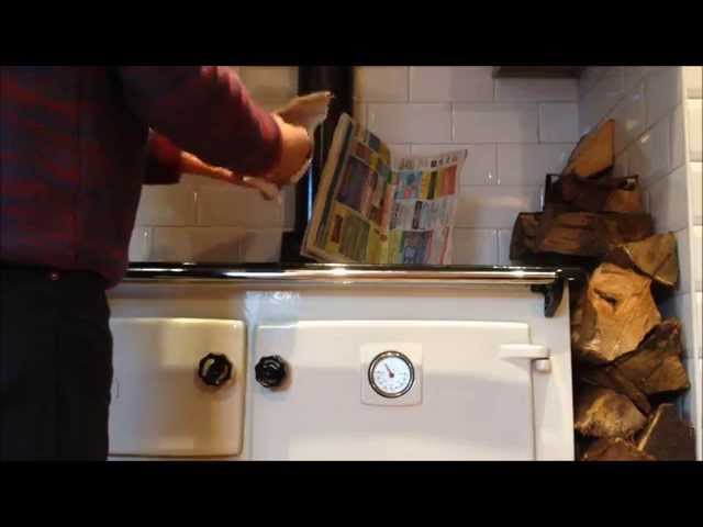 How to light a waterford stanley solid fuel range range - YouTube