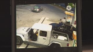 Man arrested after parking lot shootout | Surveillance video