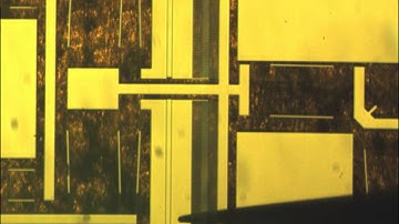 Large range dual-axis micro-stage driven by electrostatic comb-drive actuators