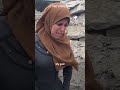 Gaza woman leaves home for flour, returns to find family buried under rubble image