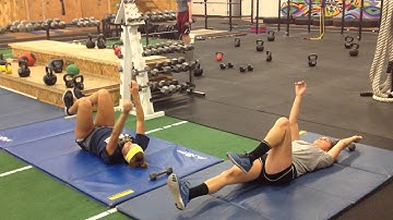 ACTUALIZE SPORTS Core Movement of the Week: Reverse Crunch into Deadbug
