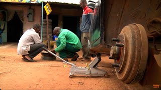 Trucks and men  Cameroon / Brazil: mud roads