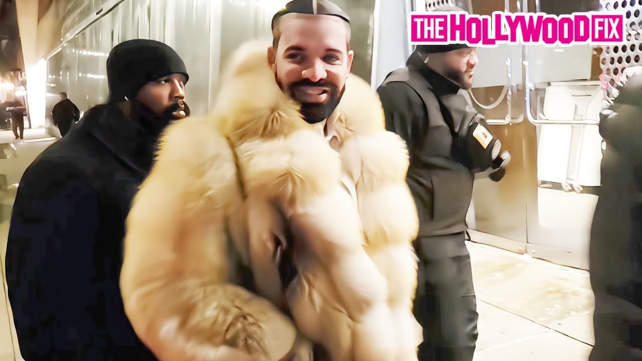 Drake's Fan Tries To Trade Coats With Him While Arriving To A Private Party At The Dream Hotel In NY