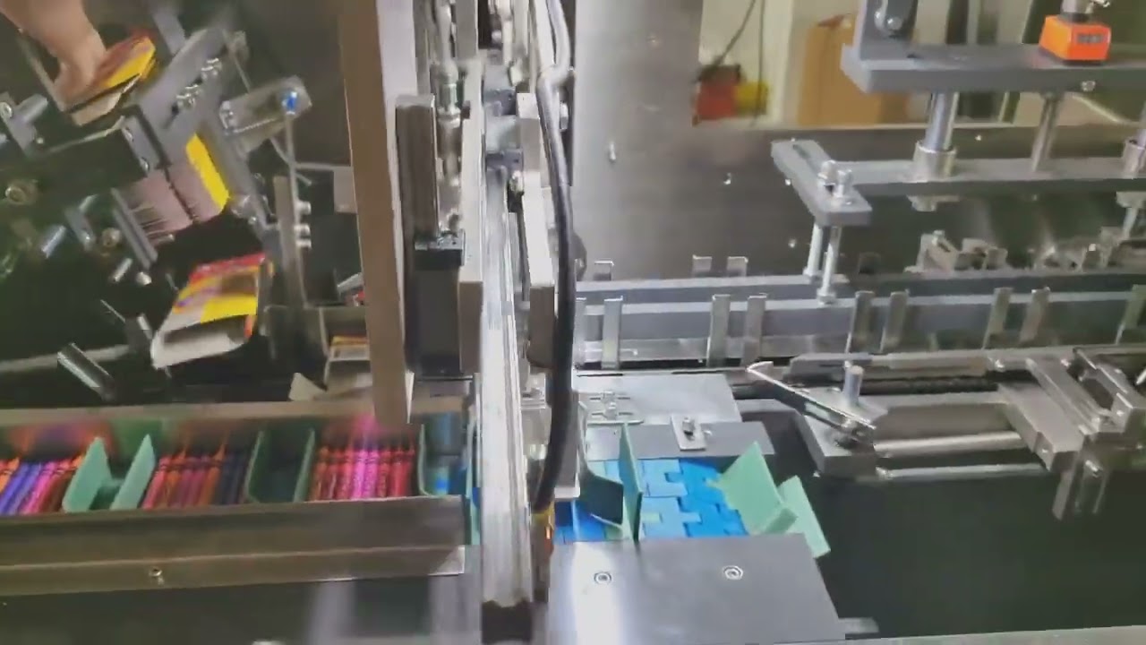 Automatic cartoning machine for crayons