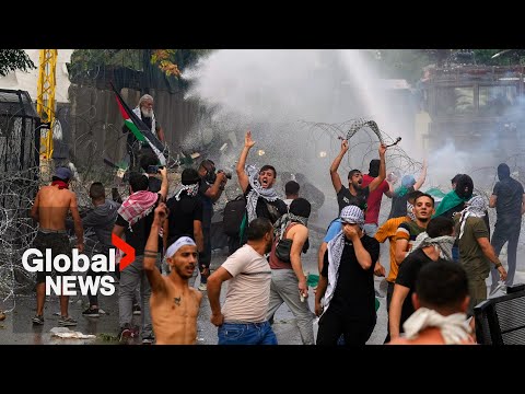 "america is the devil": protesters near us embassy in beirut hit with water cannon, tear gas