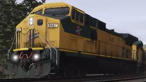 CNW #8647 leads a short mixed freight train in Train Simulator 3