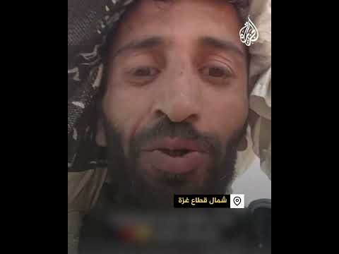 فلسطيني يوثق لحظات سعادته بحصوله على كيس من الطحين شمال غزة