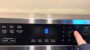 Set the clock time on a Samsung electric Range oven stove