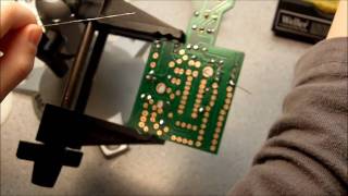 Malachi Learns To Solder and Assemble an Electronic Kit (03-25-2011)