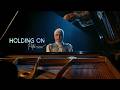 PUTRI ARIANI - HOLDING ON (Official Lyric Video)