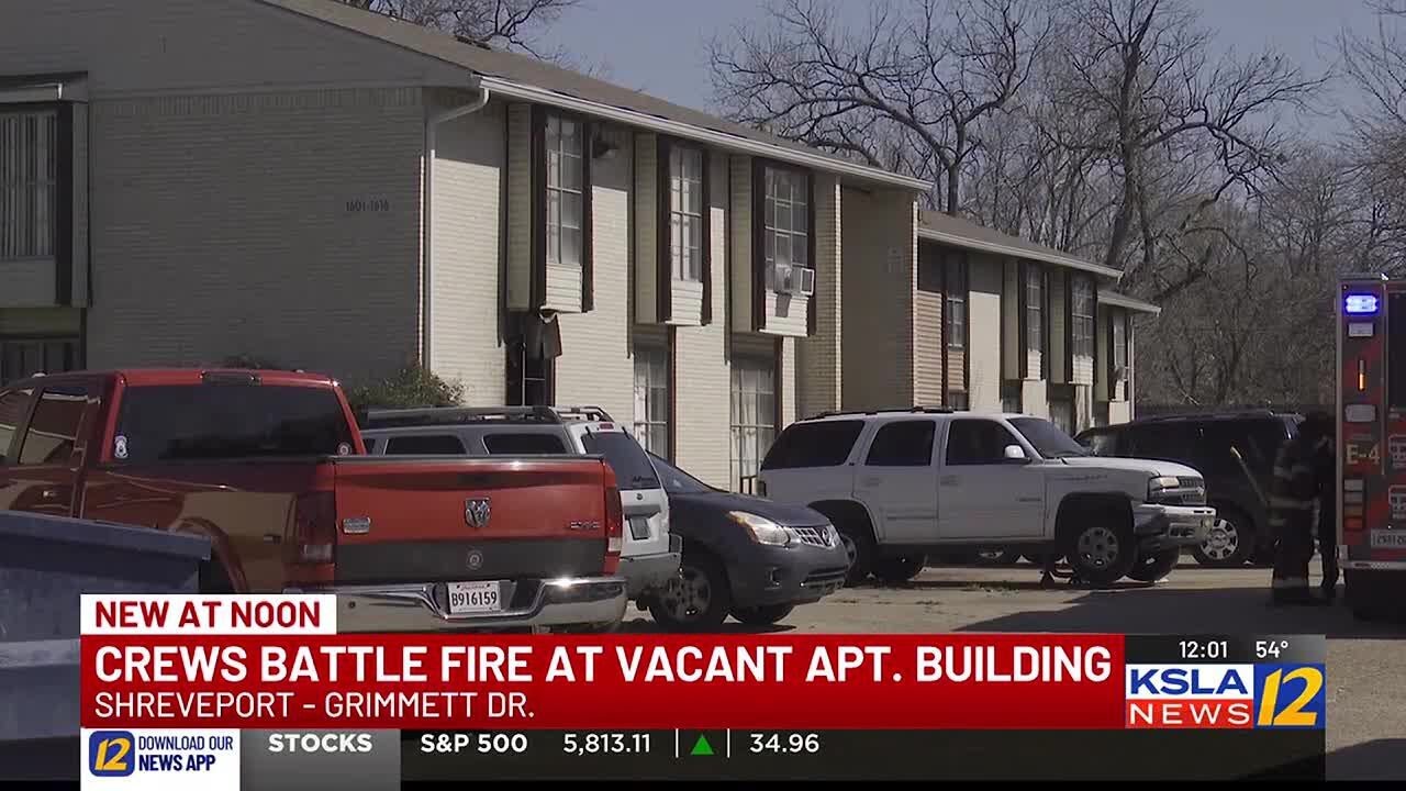 Crews battle flames at vacant apartments - YouTube