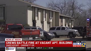 Crews battle flames at vacant apartments