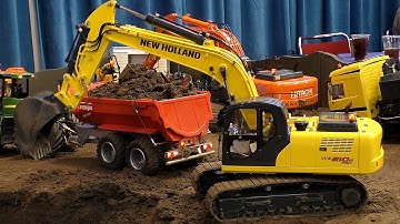 RC EXCAVATOR IN ACTION SCALE 1:14 MODEL NEW HOLLAND WE 210B PRO / Intermodellbau Dortmund 2016